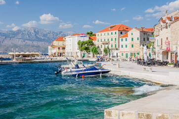 Picturesque bay and the old town of Postira. Postira lies on the northern coast of Brac island in Croatia.
