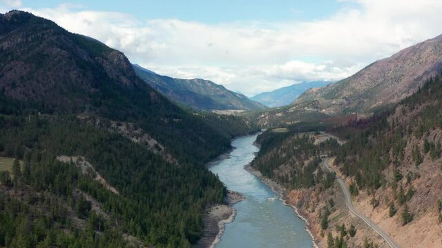 Aerial panorama photo of the Fraser River flowing in the rugged Fraser Canyon at Pavilion, Squamish-Lillooet Regional district  - Lillooet District British Columbia, Canada