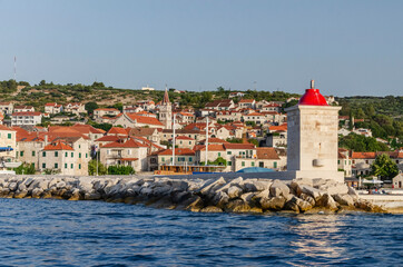 Fototapeta na wymiar Picturesque bay and the old town of Postira. Postira lies on the northern coast of Brac island in Croatia.