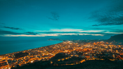 Obraz premium Terracina, Italy. Top Cityscape In Evening Night Illuminations