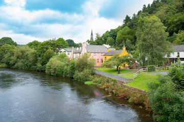 Fototapeta na wymiar Avoca township with it's quaint picturesque homes and gardens along river in , Wicklow County, Ireland