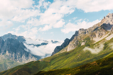 big mountains landscape with clouds. picos de europa natural park