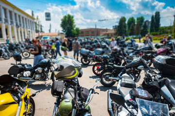 Congress of bikers. Many motorcycles in the square.