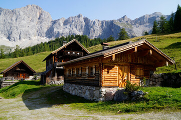 Fototapeta na wymiar traditional rustic wooden cabins in the Austrian Alps of the Schaldming-Dachstein region (Austria)