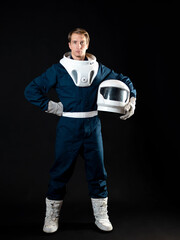 An astronaut in a spacesuit is ready for launch.