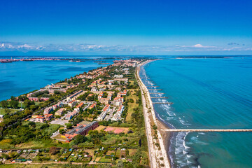 Fototapeta premium Aerial view of the Lido de Venezia island in Venice, Italy. The island between Venice and Adriatic sea.