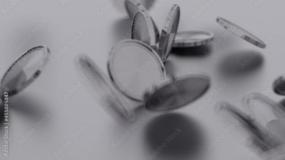 Poster shiny metallic abstract coins are falling continuously on a gray background. depth of field. close-u