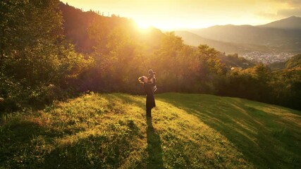 Mother and baby playing together and enjoying outdoor walk, strong relationship and connection in beautiful nature landscape