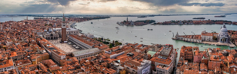 Aerial panoramic view of iconic and unique Campanile in Saint Mark's square or Piazza San Marco,...