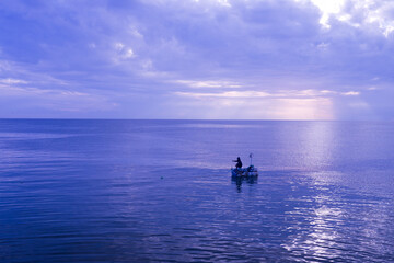Fototapeta premium man fishing in the sea, fisherman 