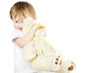 cute funny infant baby girl with big toy bear