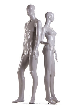 male and a female mannequin on white background