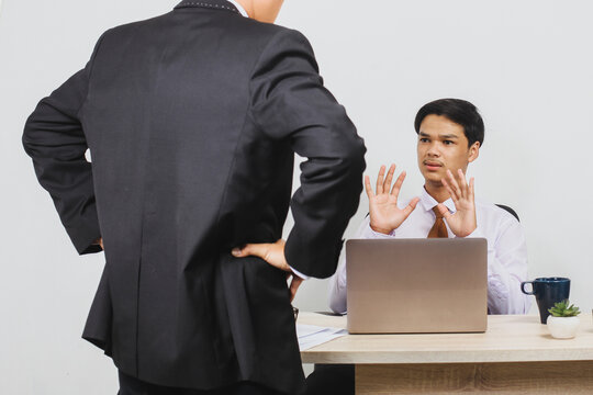 A boss scolds his employees