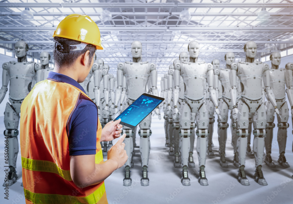 Poster technician or engineer work with robots in factory