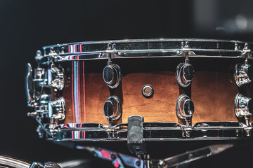 Close-up of a snare drum, part of a drum kit.