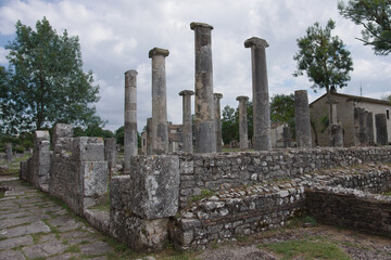 Fototapeta na wymiar Archaeological site of Altilia: Remains of columns indicating where the Basilica once stood. Molise, Italy