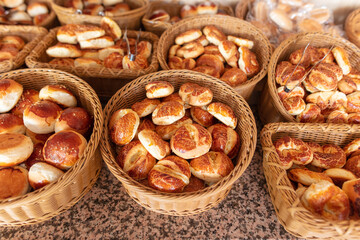 Rolls and bread in baskets. Food