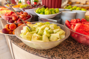 Melon and other fruits on the table.
