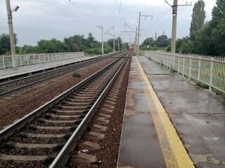 railway tracks at a station in the countryside