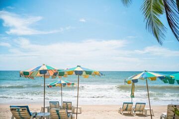 Umbrella and chairs colorful to sleep and relax on the beach in Phuket,Thailand resort.