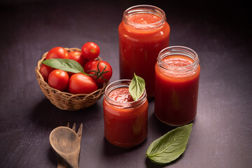 Fototapeta na wymiar Tomato sauce in a glass jar