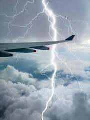 Plane is flying through the storm.Aircraft lightning.
The plane was hit by lightning.