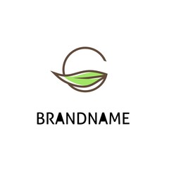 logo design letter G and green leaves,
