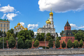 Kremlin wall and golden domes of churches on Sobornaya Square