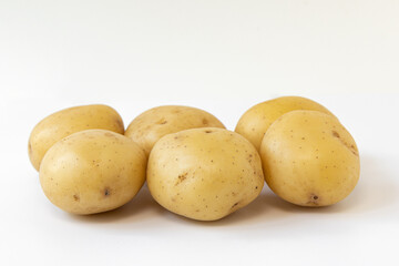 pile of potatoes isolated on white background