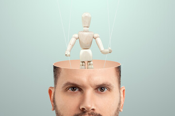 In the man's head, instead of a brain, a puppet is a doll. The concept of addiction, slave,...