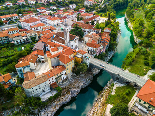 Fototapeta na wymiar Colorful Architecture of Kanal Ob Soci Town in Slovenia at River Soca Valley. Drone View.
