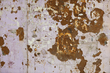 Old rusty heavy iron metal vintage painted shabby door.