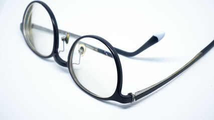 A broken eyeglass leg isolated on white background