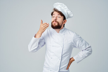 Naklejka premium bearded man Chef uniform Cooking emotions light background