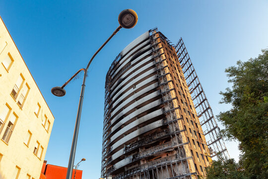 Milan, Italy - September 2, 2021: street view of the burned skyscraper Torre dei moro in Milan, after the fire of August 29, 2021.