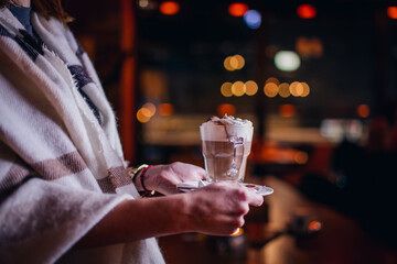 Girl holding coffee