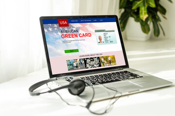 laptop with Permanent resident card of USA website