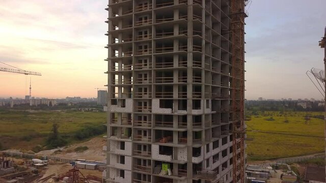 Modern residental complex under construction in the suburbs of a big city. New district, concept of urbanization.