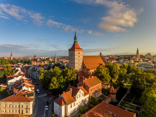 St. James, Evangelical church, castle of the Warmia chapter, garrison church of the Blessed Virgin Mary, Queen of Poland and the Town Hall - at sunrise - Olsztyn, Warmia and Masuria, Poland, Europe