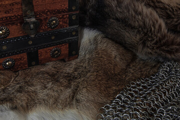 Old chest, fur and chainmail