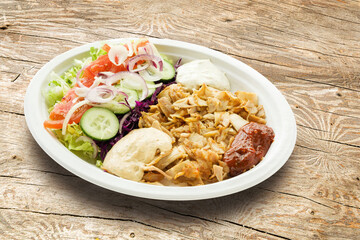 Delicious chicken doner kebab grilled meat with mixed vegetables.