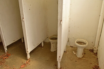 Ruined toilet and restroom of an old building