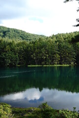 A scenic pond in the mountains at an altitude of 1,500 m in Nagano Japan.