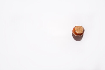 Nuts in shell, hazelnuts on a white background. heap or pile of nuts. Nuts background, healthy food