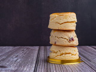 Side view of scones traditional English delicious fresh bake homemade on wooden table with a...