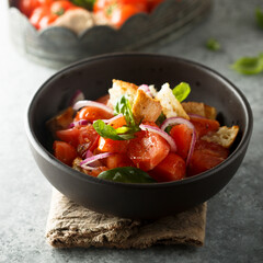 Traditional Italian panzanella salad with tomato and bread