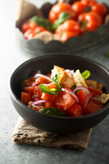Traditional Italian panzanella salad with tomato and bread