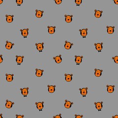 Seamless pattern with cute tiger cubs. Design for children's clothing, fabrics and other items. The illustration is hand-drawn with live lines in the kartun style.