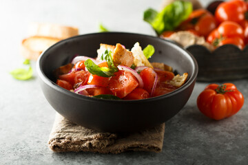 Traditional Italian panzanella salad with tomato and bread