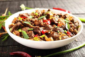 Delicious Indian mutton roast ,fry . traditional recipes background.